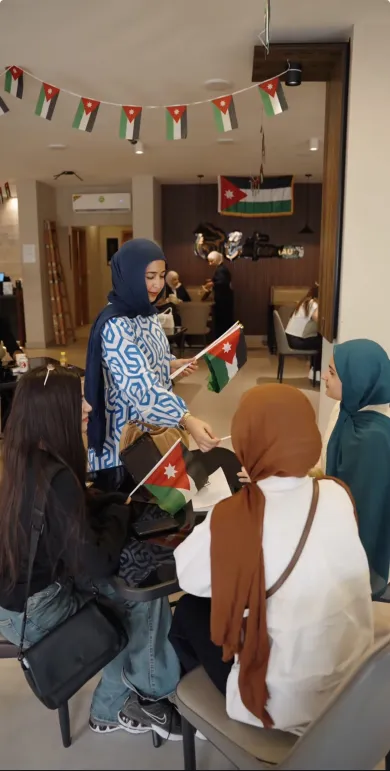 Students with Jordanian flags at Canteen